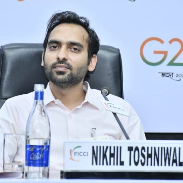 Nikhil T.